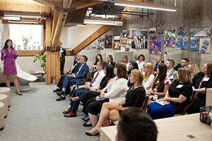 Founder & CEO, Rebecca Corbin giving a company-wide presentation at the Farmington, CT Headquarters